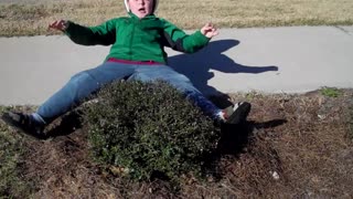 Skateboarding Kid Crashes Into Bush After Downhill Race