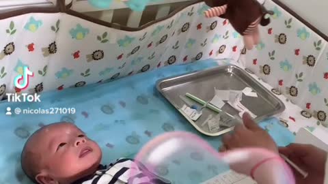 Video of baby son getting vaccinated