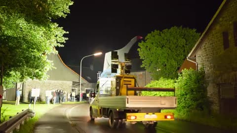 Giant Rotor Blade moved trough a small town _ Heavy Haulage