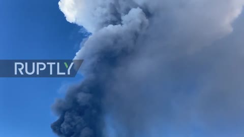 Italy: Spectacular eruption from Mount Etna sends lava fountain and massive ash column into sky