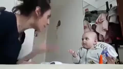 Its funny baby talking to her mother