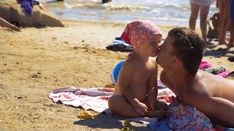 Father And Daughter At The Beach