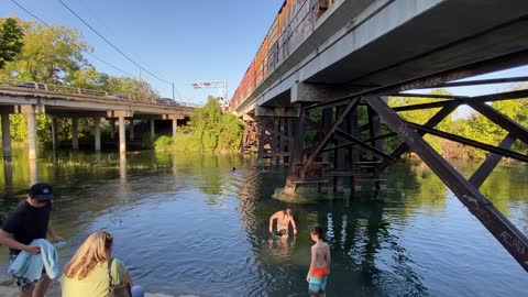 San Marcos River with Train passing