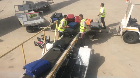 Airport luggage unload