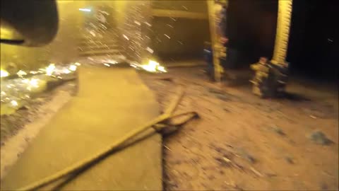POV Footage Shows Firefighter Catching Child From Burning Building