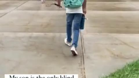 Blind student enthusiastically finds way around school on his first day