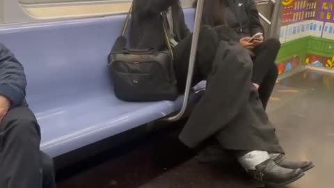Wearing Stilts on a train