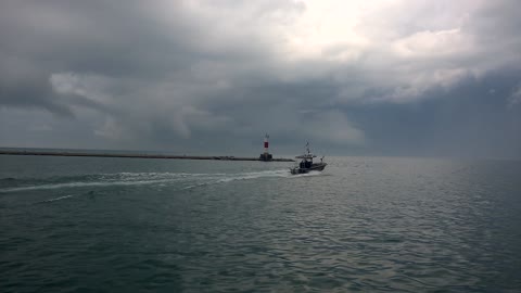 Lake Michigan Harbor Light, Boaters & Storm Clouds