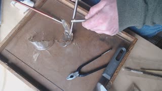 Traditional, lacquer based kintsugi, applying metal to glass lacquer