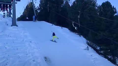 Snowboarder knocks down whole row at T lift...