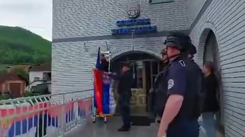 Footage of Pristina police removing Serbian flags from administrative buildings