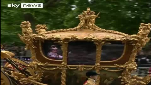 Queen Elizabeth appears as hologram inside 260-year-old golden carriage – video
