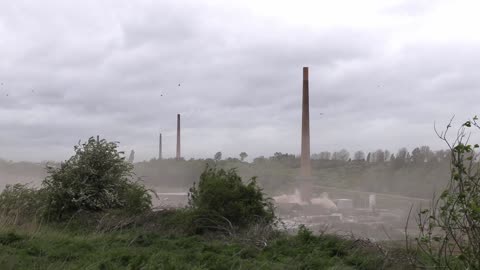 Watch as 50 Year old 300ft former brickwork chimneys blown to pieces in controlled demolition
