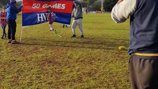 Boy Bounces Off Aussie Rules Football Celebration Banner