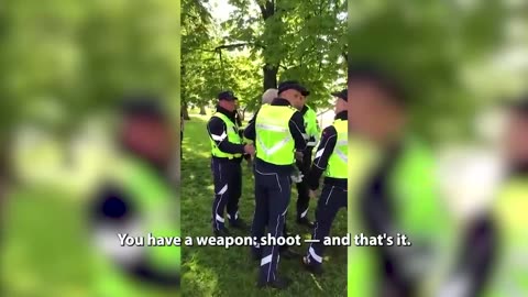 Latvian policemen detaining an elderly man goes viral