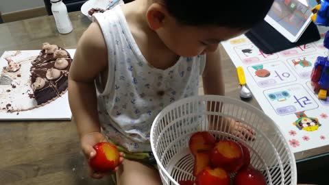 Adorable Toddler Busted For Wasting Fruit