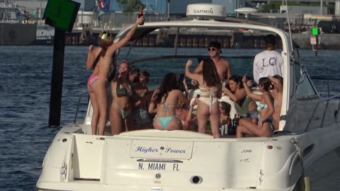 Young People on boats and yachts in Miami having fun !!!!