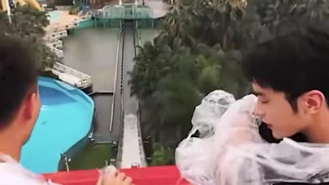 Ripping each other’s raincoats in water roller coaster!