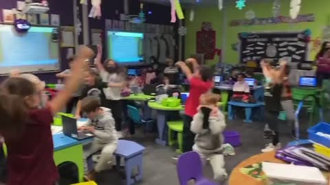 Kids burst in cheers as the teacher tells them they don't need to wear masks anymore!