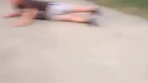 Fat boy falls with skateboard