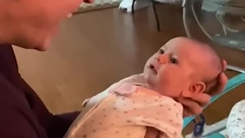 Newborn baby mimic Dad's voice