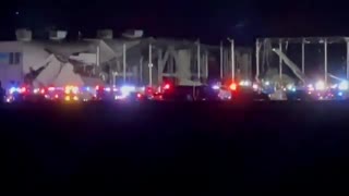 Amazon distribution warehouse in Edwardsville, Ill. is partially collapsed after Friday tornado.