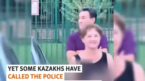 Kazakhs Confront Russian Tourists Over 'Z' Stickers On Cars