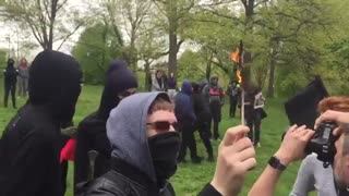 May 13 2017 Boston free speech 1.3 Antifa burning mini USA flag for cameras