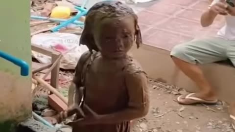 Baby girl transforms with mud