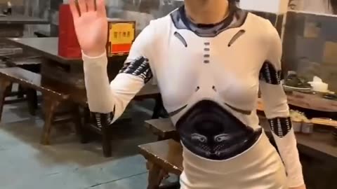 A Realistic Chinese Robot Waiter Enhances Dining Experience in a Chongqing Hotpot Restaurant