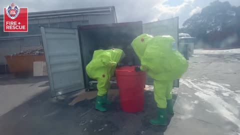 DANGER ZONE: Firefighters In Hazmat Suits Clean Up Chemical Spill
