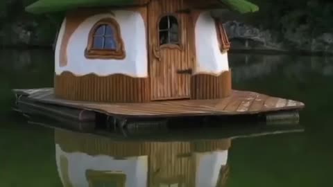 The most beautiful house floats on the surface of the river