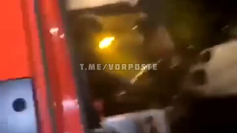Rioters attack French firemen and loot their fire truck.