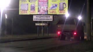 Military vehicles seen driving through Donetsk outskirts