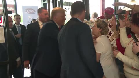 Trump hands out free ice cream at Dairy Queen following campaign rally in Iowa