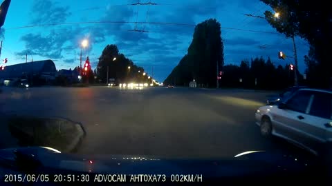 Russian Lada at an intersection sharply enters a bend