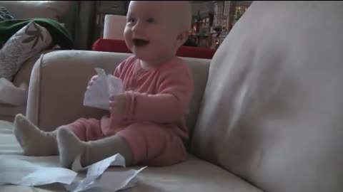 Laughing baby | Baby laughs at paper tearing