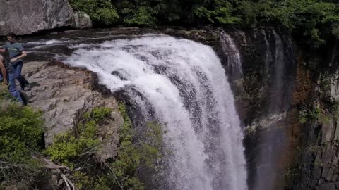 A High Waterfalls Off A Cliff