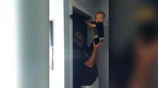 Son Makes Workout Grunts When Father Pretends He's Doing Pull Ups