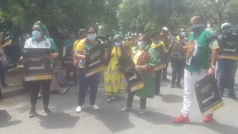 Members of the African National Congress (ANC) picket outside the eNCA studios in Hyde Par