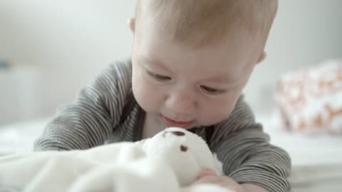 Royalty free Videos for YouTube - Cute baby playing with a teddy