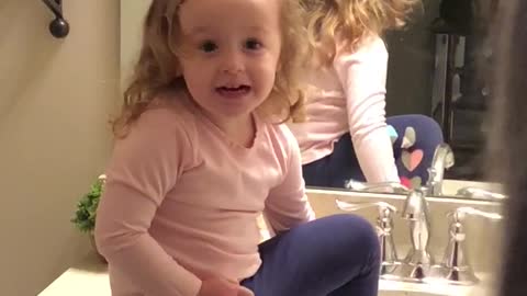 Little girl discovers she has eyebrows