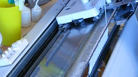 Double Bed e-wrap on a Singer Knitting Machine