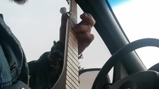 Playing banjo in my van