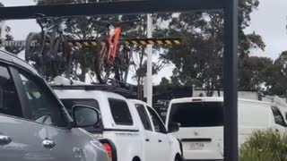 Rooftop Mounted Bike Rammed Into Low Clearance Sign