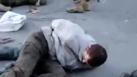 Ukrainian Azov Nazis shooting Russian POW