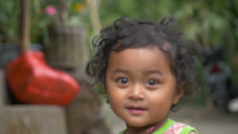 A very beautiful shot taken of a young balinese child