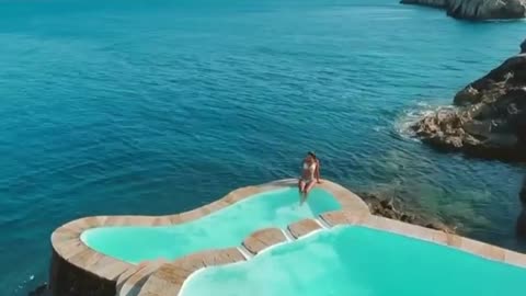 Cliffside pools in greece