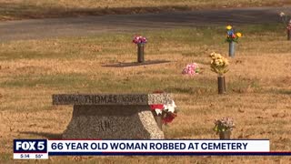 A 66-year-old woman was robbed while visiting her son’s grave