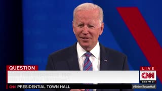 Biden grins as he says it’s “mildly fascinating” that Fox News has vaccine mandates